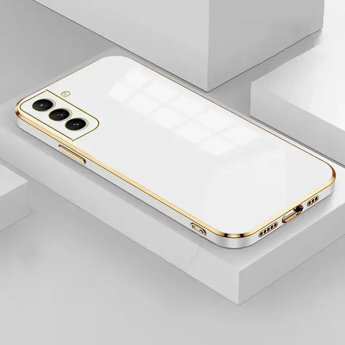The iphone 11 is a gold case with a white back and gold sides