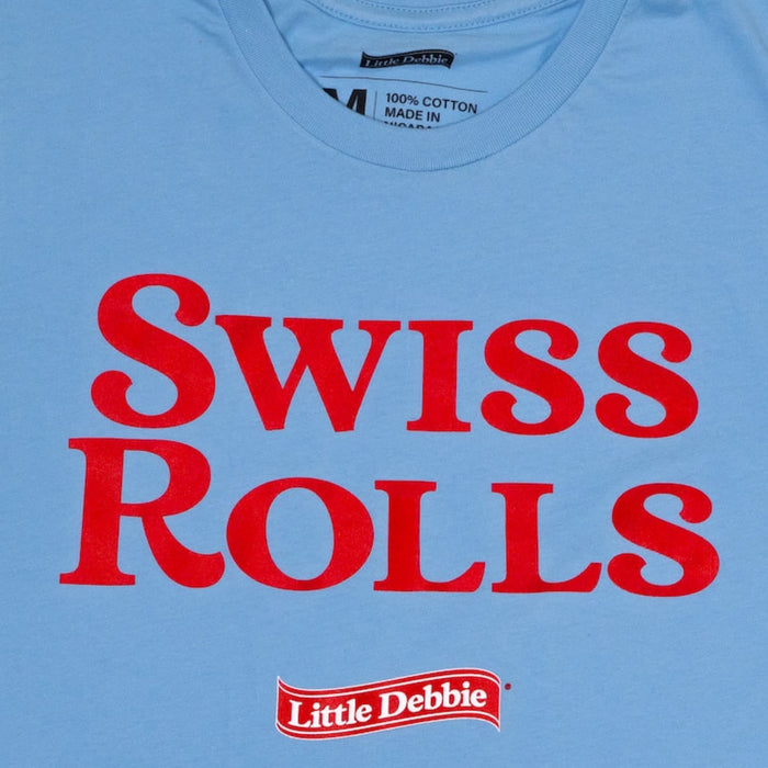 Swiss Rolls graphic logo printed in red over a solid light blue unisex t-shirt with a small red Little Debbie logo below.