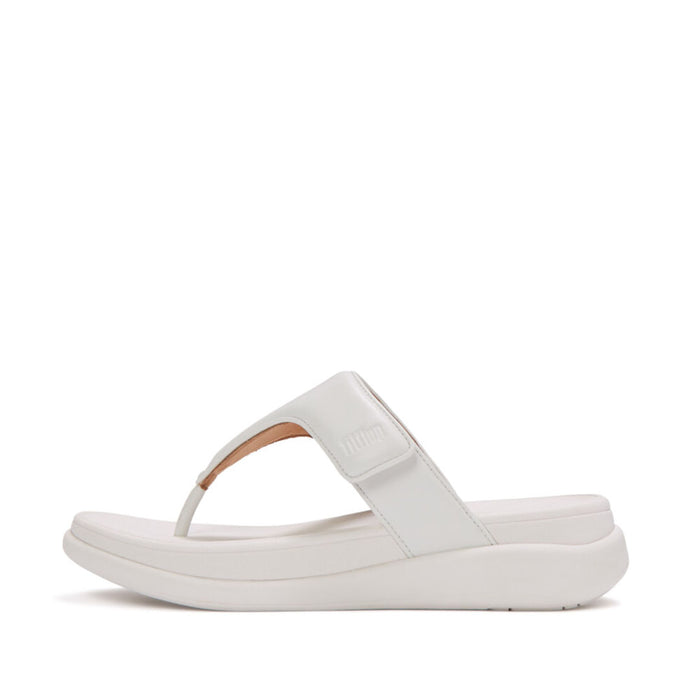Side view of FitFlop F-MODE Go Adjustable Flatform Toe-Post Sandals showcasing the padded metallic upper and ultra-light cushioned sole.