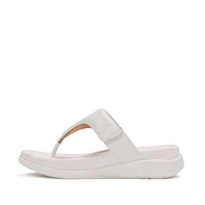 Side view of FitFlop F-MODE Go Adjustable Flatform Toe-Post Sandals showcasing the padded metallic upper and ultra-light cushioned sole.