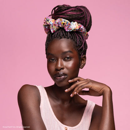 KITSCH Lisa Frank x Kitsch Pillow Scrunchies® in The Fantastic World of Lisa Frank — model wearing Lisa Frank satin pillow scrunchie — silky satin won't crimp or damage hair while you sleep
