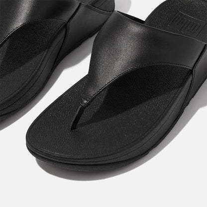 LULU leather toe-post sandals with padded Microwobbleboard™ midsole, ergonomic arch support, and minimalist triangular vamp design.