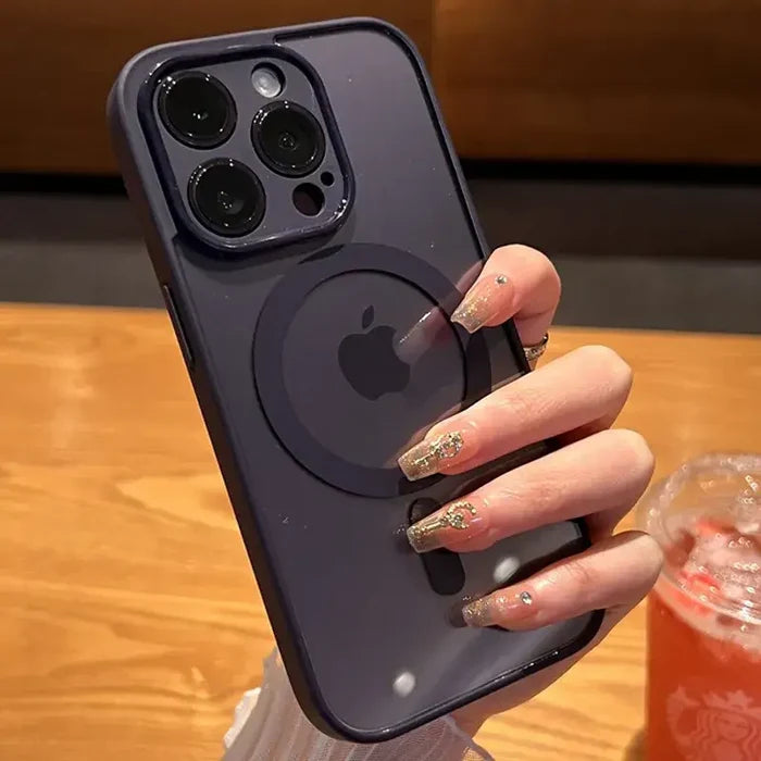 A woman holding a phone with a ring on it