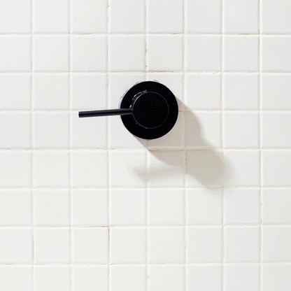 Demonstration of the Kitsch Beauty Bar Bag being used in the shower to lather a solid shampoo bar
